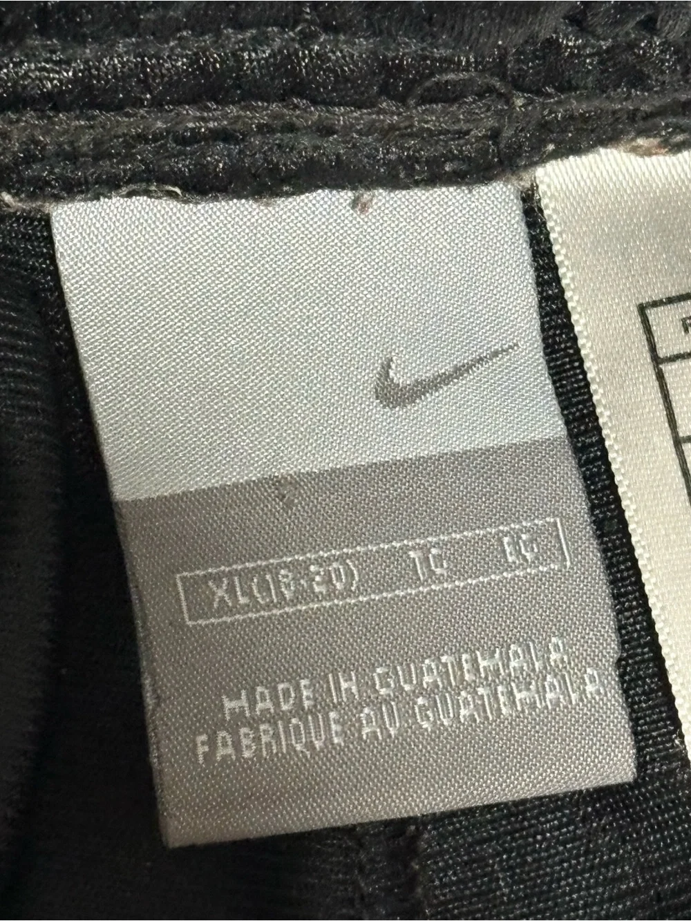Nike Black Athletic Basketball Shorts with White Swoosh